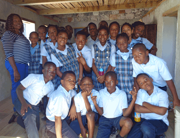 Students inside the Caicos Heritage House